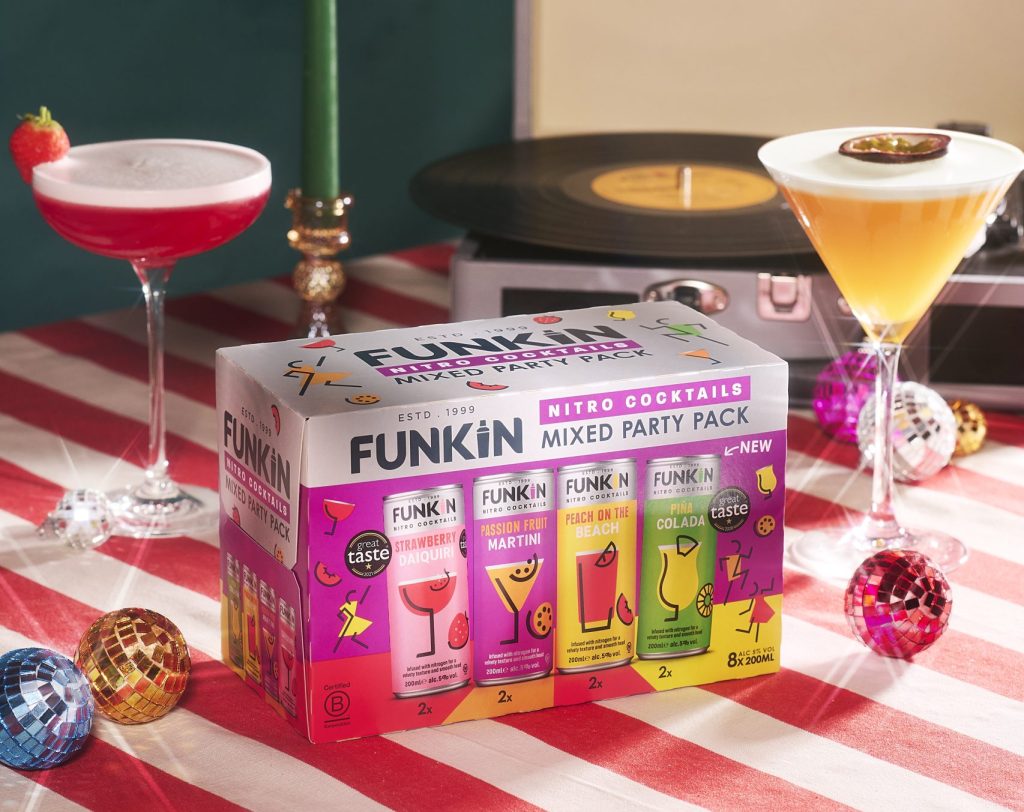 Photograph of a party scene featuring FUNKIN cocktail cans