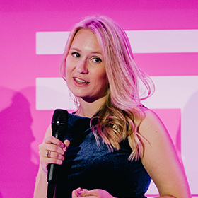 Lady on stage with microphone
