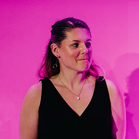 Lady on stage at corporate event