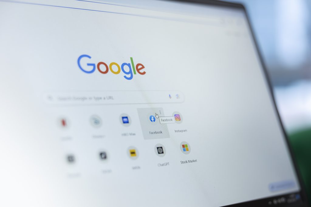 User clicks on Facebook page bookmark on Google, looking at search engine saved icons and selecting social media platform.